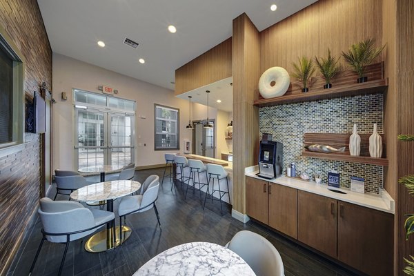 Clubhouse with modern decor at 33 West Apartments offering luxury living spaces