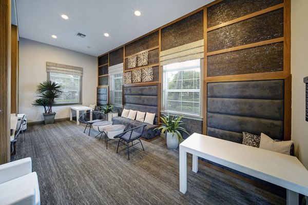 Elegant clubhouse with modern decor at 33 West Apartments, offering a luxurious living experience