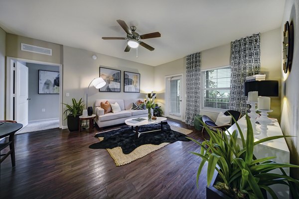 Modern living room with sleek furnishings at 33 West Apartments, ideal for luxury living in a Greystar community