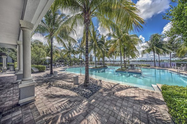 Resort-style poolside lounge at 33 West Apartments, luxury living destination
