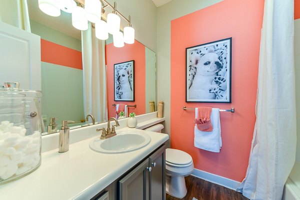 Bathroom featuring modern fixtures and elegant tilework at Townhouse Atlanta luxury apartments