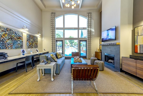 Contemporary clubhouse with cozy lounge seating at Townhouse Atlanta luxury apartments