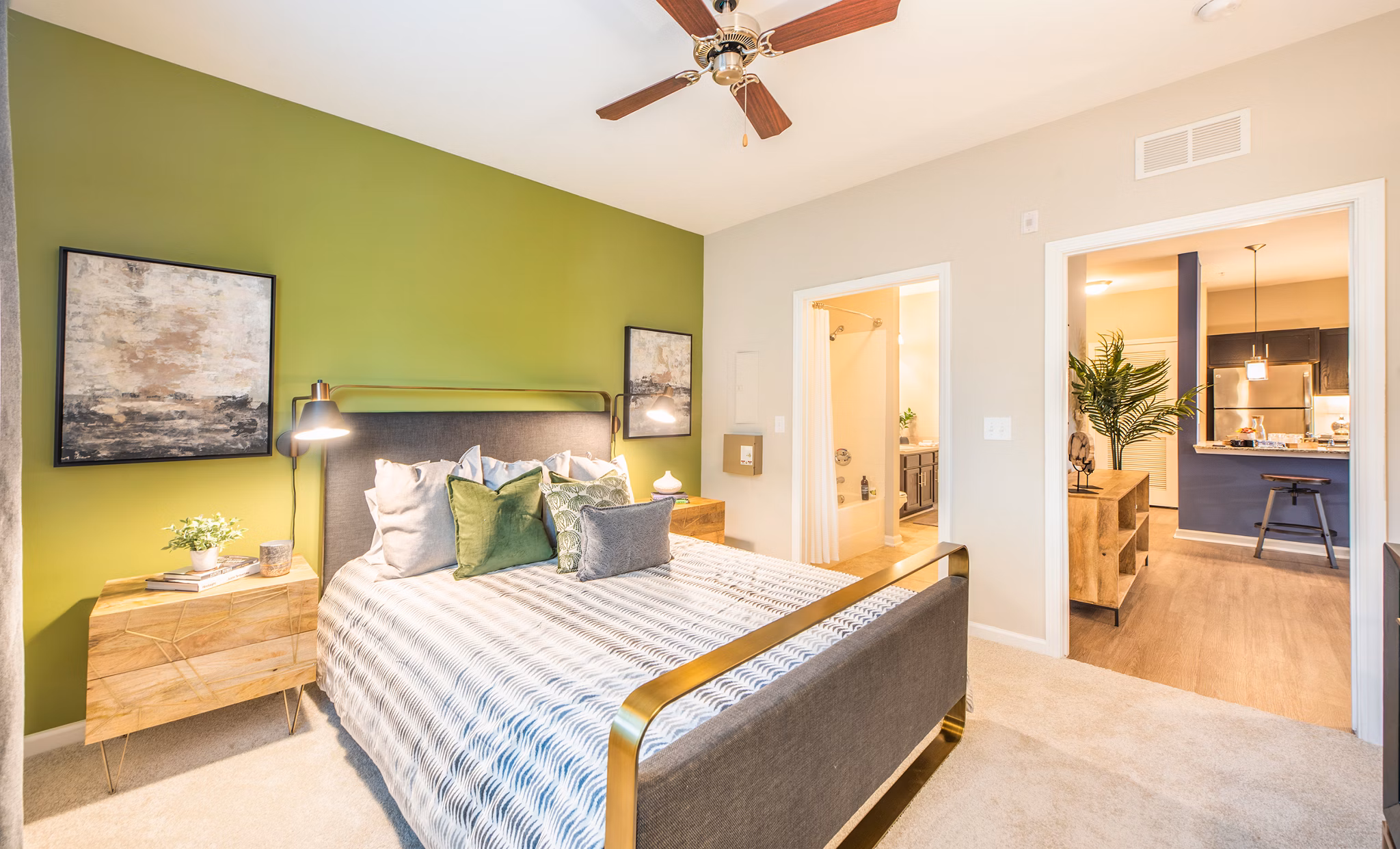 Element Carolina Bay Apartments: Modern bedroom with stylish decor and ample natural lighting
