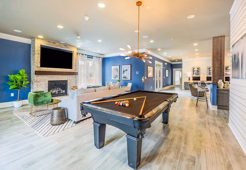 Luxurious clubhouse with modern amenities at Element Carolina Bay Apartments in Charleston, ideal space for relaxation and socializing