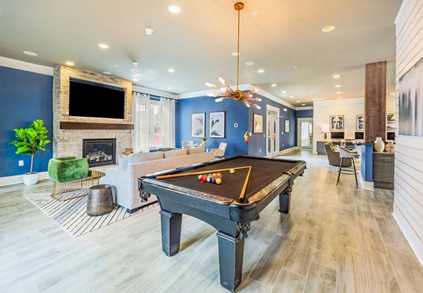 Luxurious clubhouse with modern amenities at Element Carolina Bay Apartments in Charleston, ideal space for relaxation and socializing