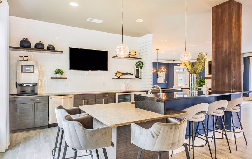 Clubhouse featuring modern design and seating at Element Carolina Bay Apartments in Charleston, a luxury community by Greystar