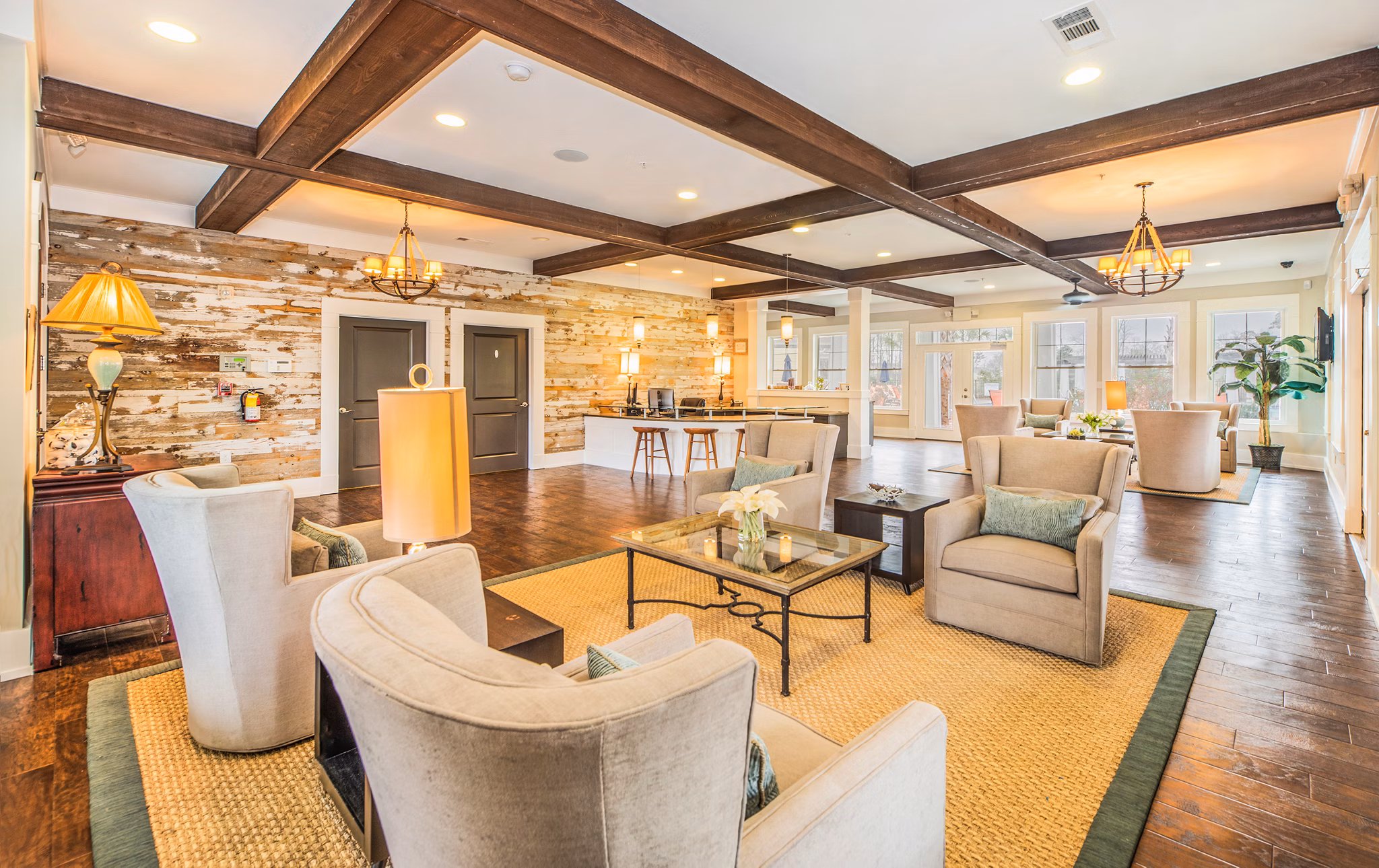 Modern clubhouse at Element Carolina Bay Apartments with elegant lounge areas and state-of-the-art amenities