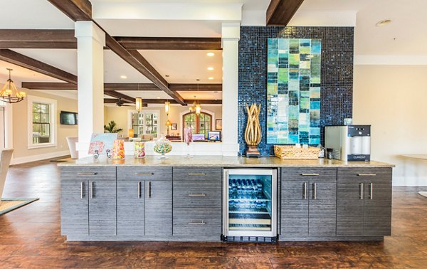 Clubhouse with modern decor at Element Carolina Bay Apartments in Charleston