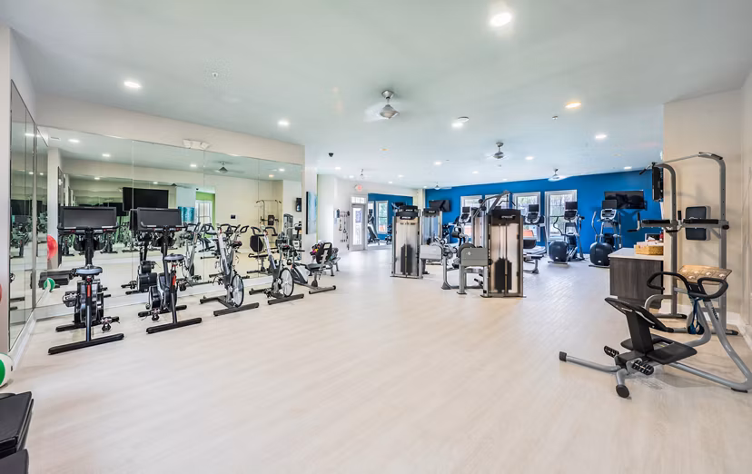 State-of-the-art fitness center at Element Carolina Bay Apartments with modern equipment for an optimal workout experience