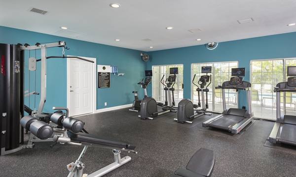 fitness center at The Lennox of Olathe Apartments
