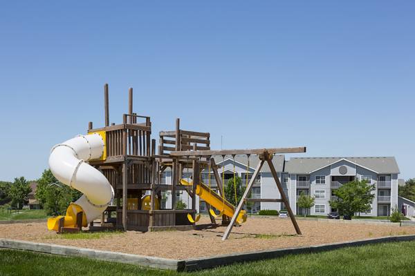 playground at The Lennox of Olathe Apartments