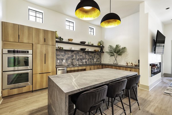 Modern community clubhouse featuring stylish seating and entertainment areas at 3500 Westlake luxury apartments