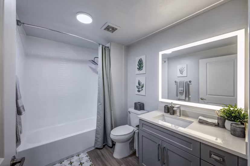 Modern bathroom featuring sleek fixtures and designer tiles at Solmar on 6th luxury apartments