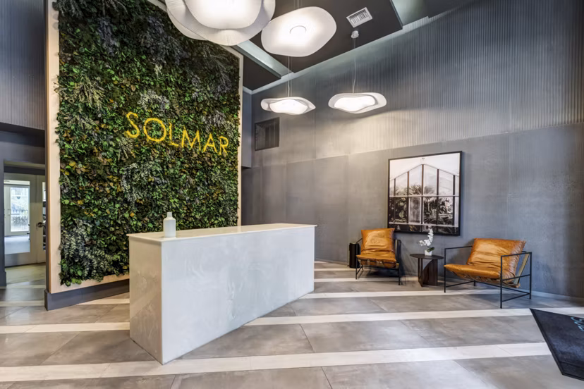 Modern clubhouse featuring sleek furniture and vibrant dÃ©cor at Solmar on 6th luxury apartments