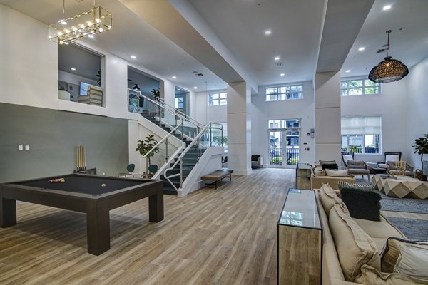 Modern clubhouse featuring sleek furniture and vibrant dÃ©cor at Solmar on 6th luxury apartments
