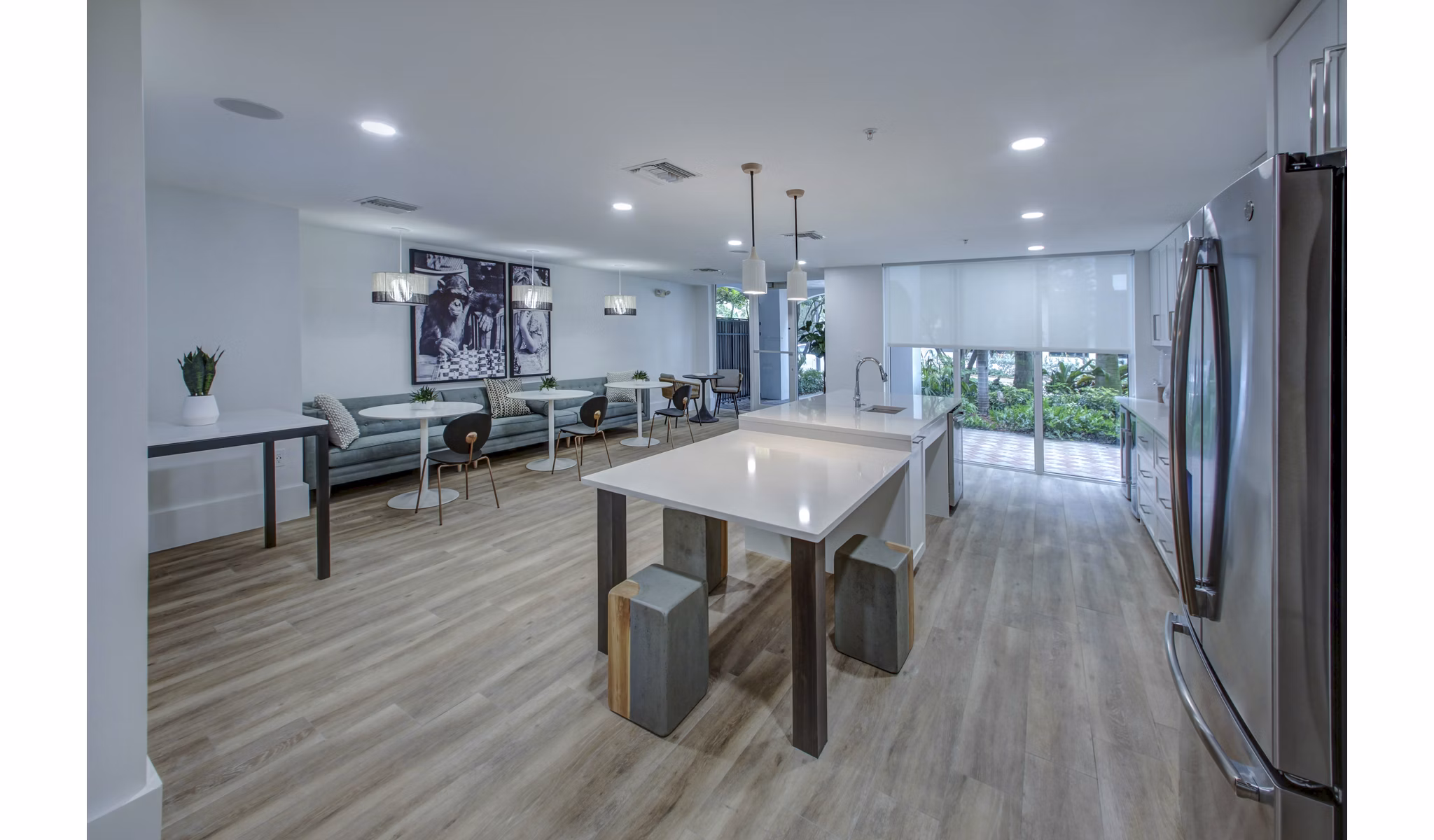 Modern spacious clubhouse with lounge seating and pool table at Solmar on 6th luxury apartments