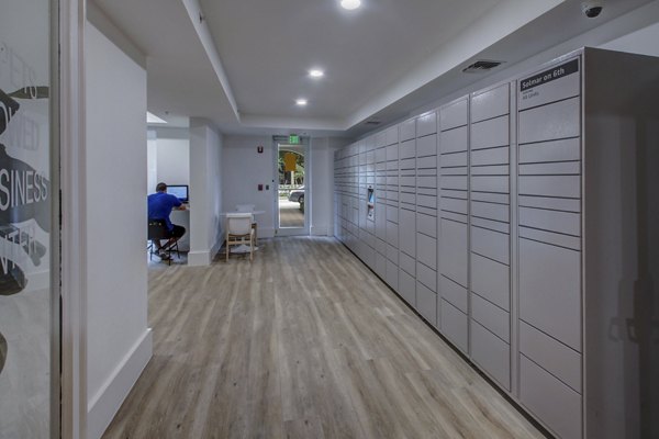 Mail room with sleek design and secure mailboxes at Solmar on 6th apartments