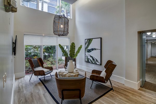 Clubhouse featuring modern design and seating at Solmar on 6th luxury apartments