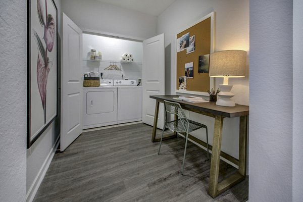 Cozy kitchen with stainless steel appliances at Solmar on 6th luxury apartments, perfect for modern living