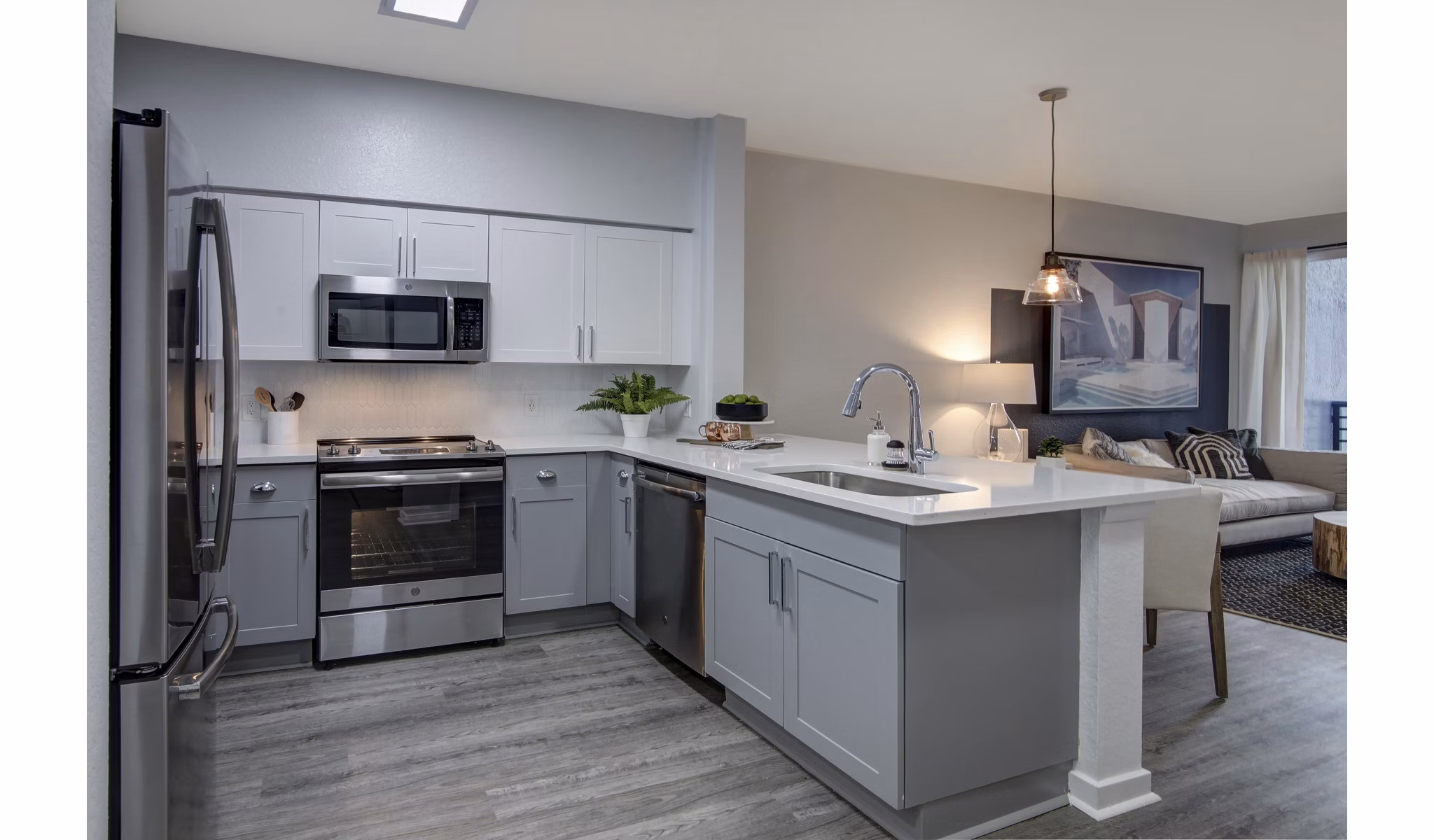 Modern kitchen featuring stainless steel appliances at Solmar on 6th luxury apartments