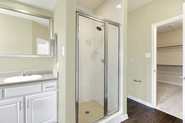 Modern bathroom with elegant fixtures at The Boulevard at Town Lake Apartments