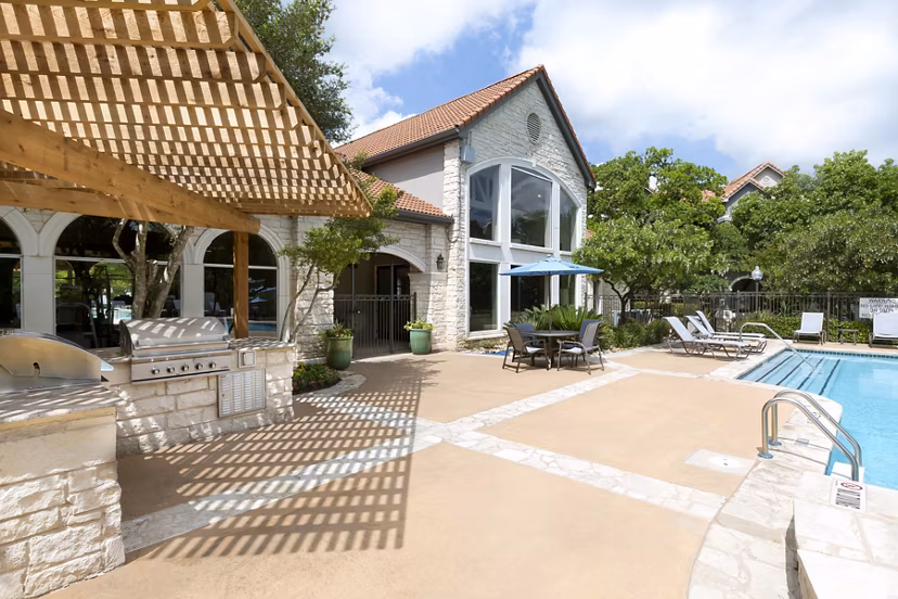 Resort-style pool at The Boulevard at Town Lake Apartments offering luxury amenities and relaxation