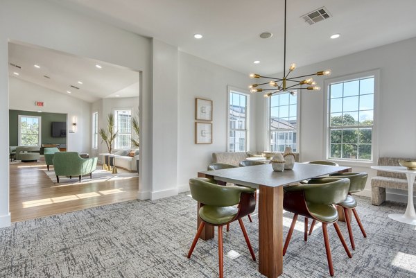 Dining room featuring elegant furnishings and modern lighting at Archer Stone Canyon Apartments