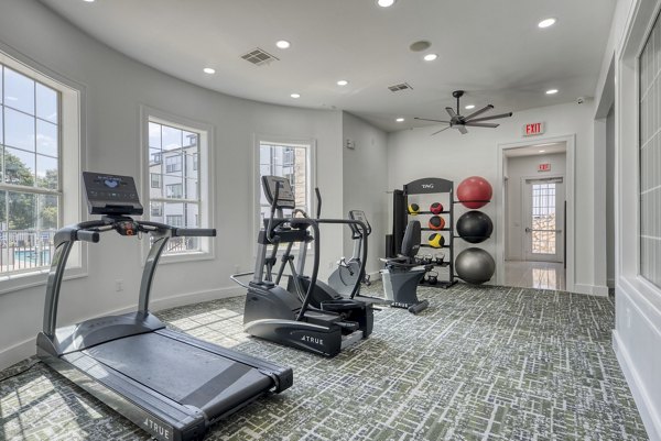 State-of-the-art fitness center at Archer Stone Canyon Apartments with modern equipment and spacious workout areas