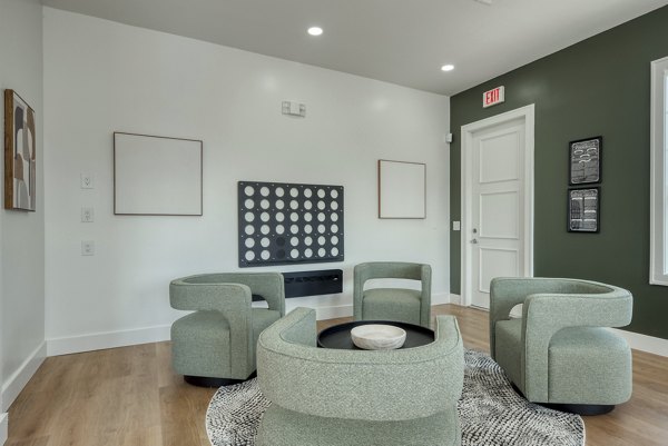 Spacious living room with elegant furnishings in Archer Stone Canyon Apartments