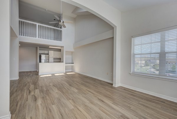 Spacious patio with modern seating at Archer Stone Canyon Apartments, perfect for relaxation and outdoor dining