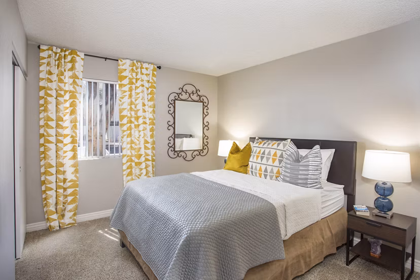 Cozy bedroom featuring elegant decor at Highland Park Apartments