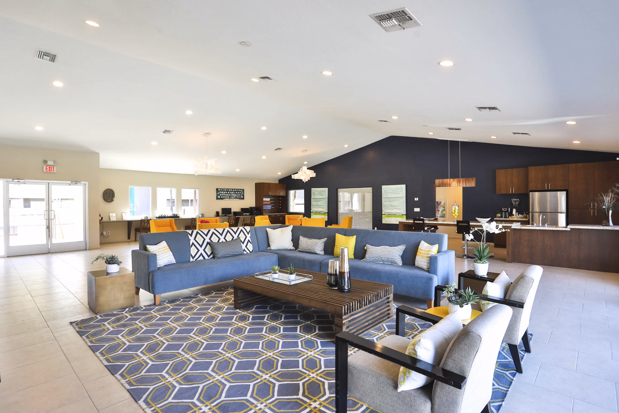 Clubhouse with modern design and comfortable seating at Highland Park Apartments