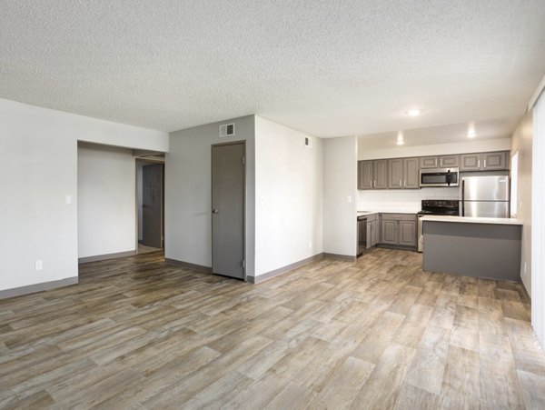 Dining room featuring elegant modern furniture at Highland Park Apartments