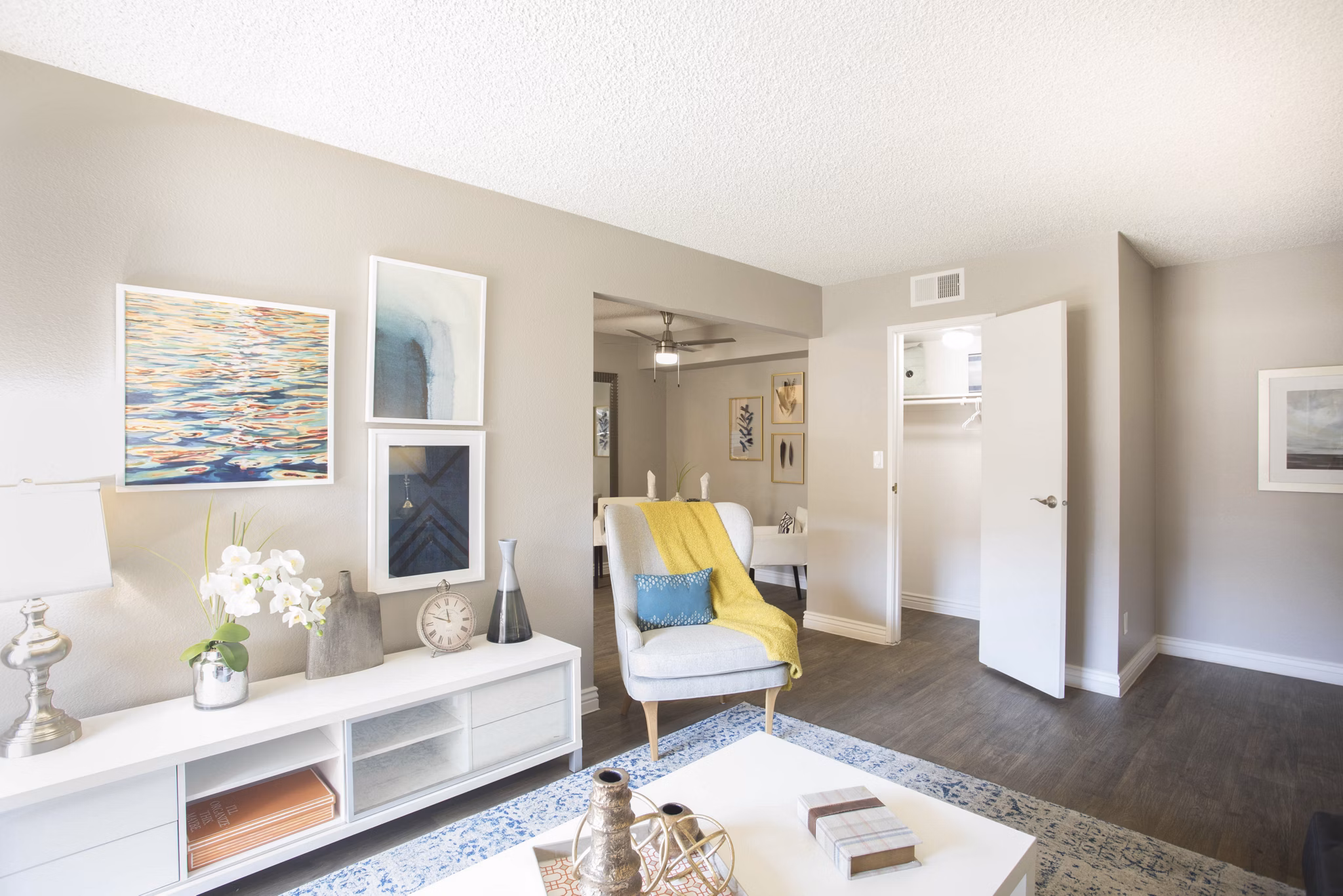 Spacious living room with stylish decor at Highland Park Apartments, luxury living by Greystar
