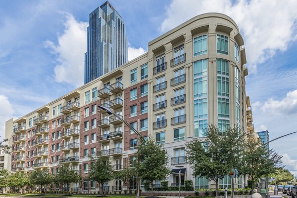 WaterWall Place: Elegant of luxury apartments in Houston, highlighting modern design with vibrant landscaping