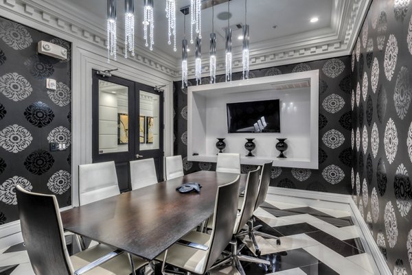 Clubhouse featuring modern interiors and cozy seating at WaterWall Place Luxury Apartments