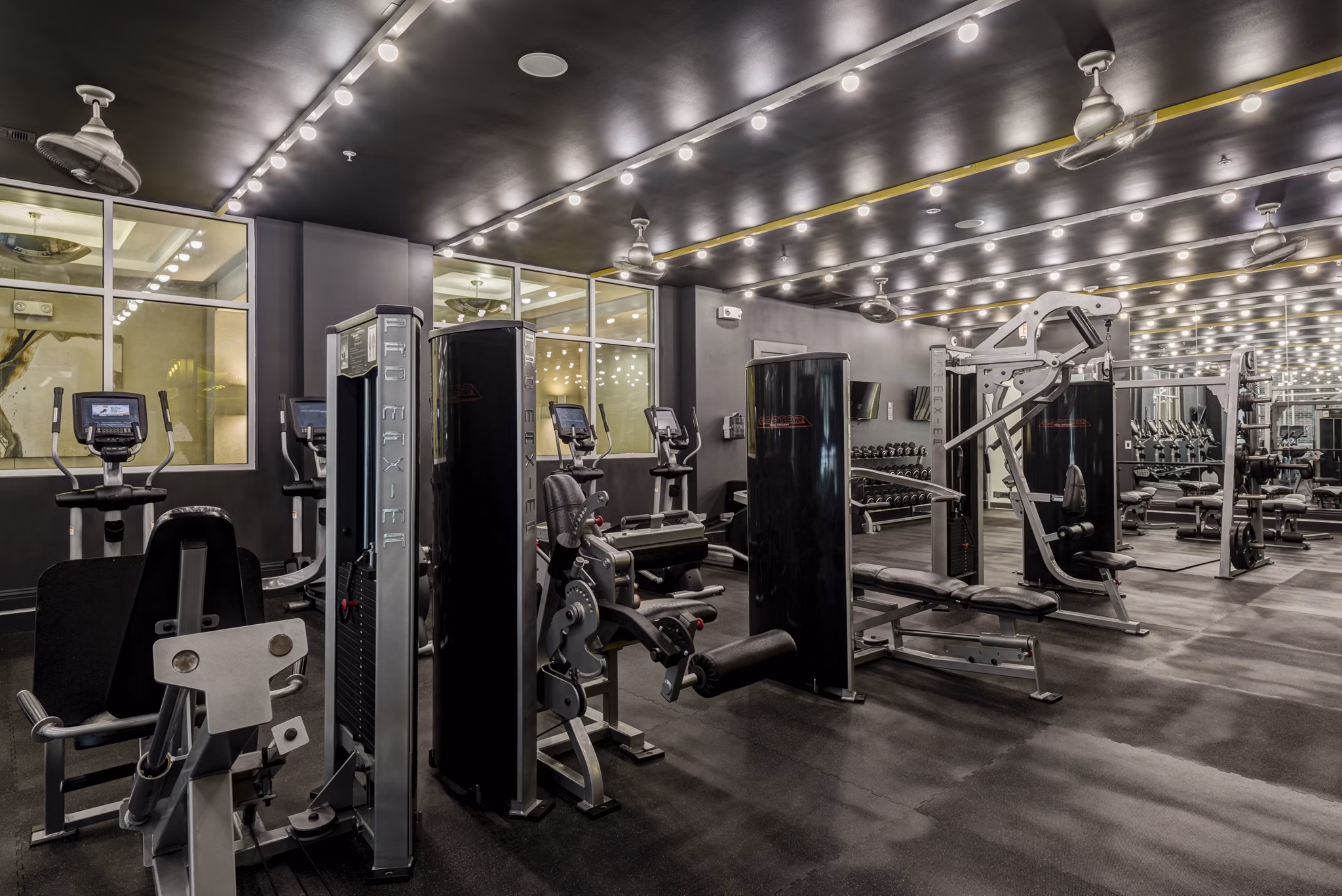 State-of-the-art fitness center with modern equipment at WaterWall Place Luxury Apartments, promoting wellness and active living
