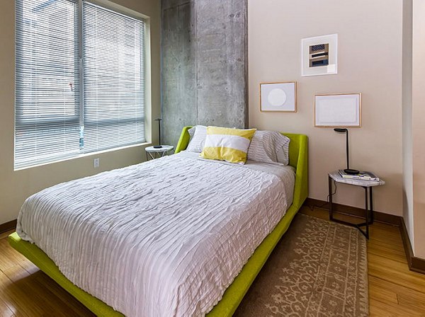 Elegant bedroom with stylish decor at The Granary Apartments