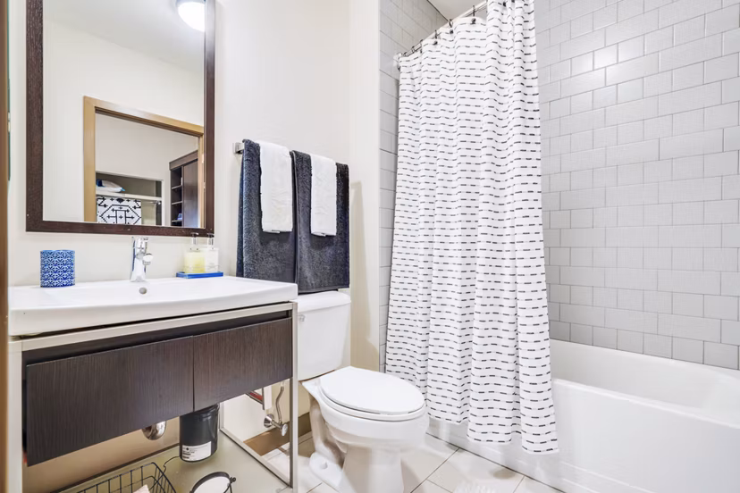 Modern bathroom with sleek fixtures at The Granary Apartments, featuring stylish tiles and ample lighting for a luxury living experience