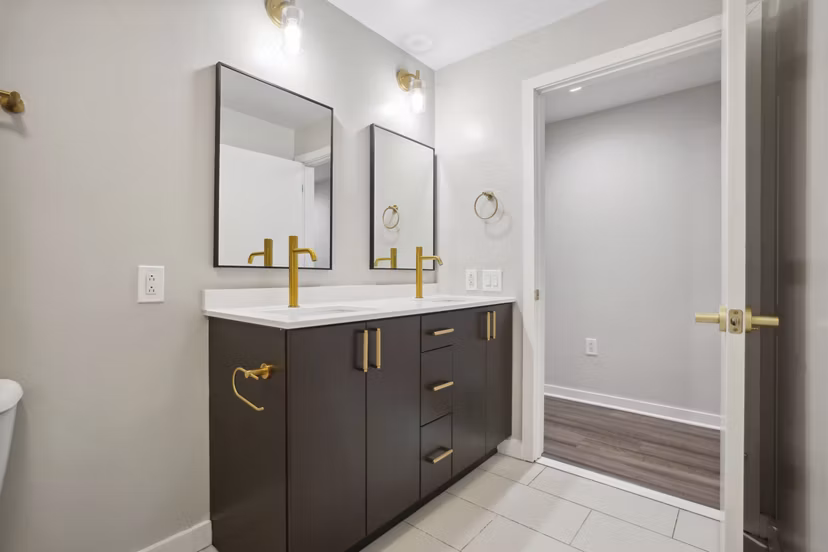 Modern bathroom with sleek fixtures at The Granary Apartments, offering luxury living in a stylish setting