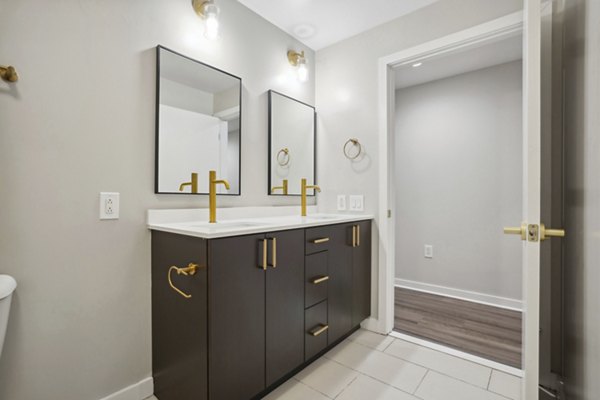 Modern bathroom with sleek fixtures at The Granary Apartments, offering luxury living in a stylish setting