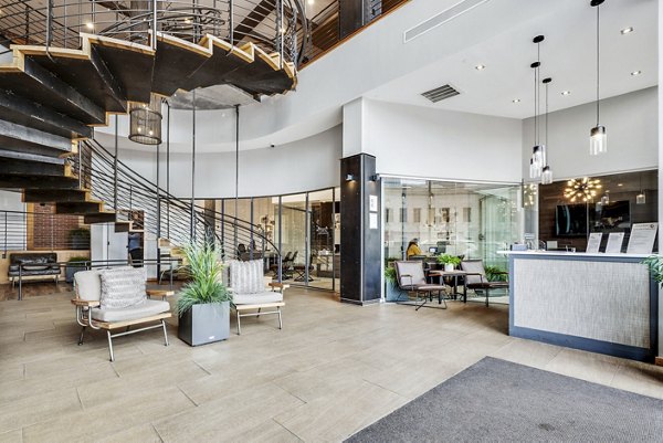 The Granary Apartments: Luxurious clubhouse/lobby with modern design and ample seating in prime central location