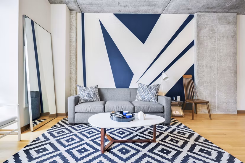 Spacious living room with modern decor in The Granary Apartments