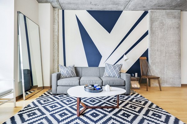Spacious living room with modern decor in The Granary Apartments