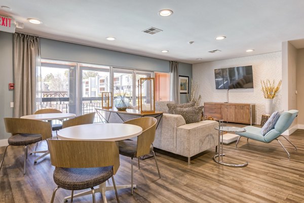 Clubhouse featuring modern seating and entertainment area at Park Kiely Apartments