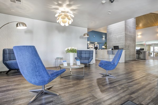 Clubhouse lounge with modern seating and decor at Park Kiely Apartments, a luxury community in the heart of Silicon Valley