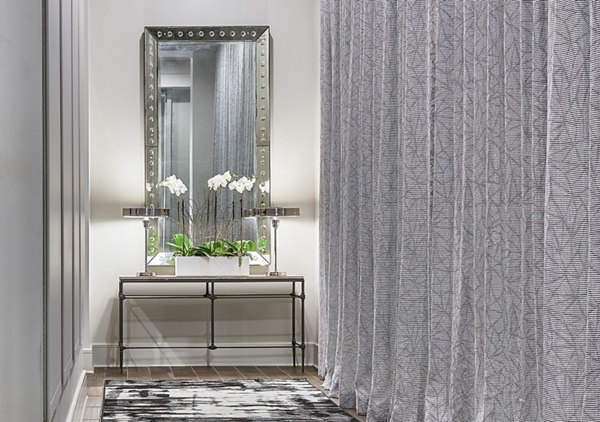 Sleek modern elevator at Solis SouthPark Apartments, a luxury property offering convenient urban living and stylish features