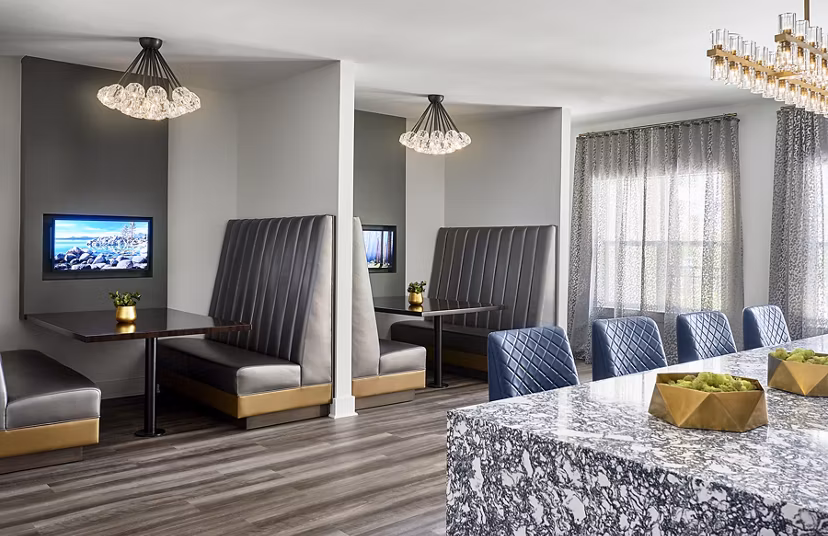 Clubhouse with modern amenities at Solis SouthPark Apartments, perfect for socializing and relaxation in a luxury setting