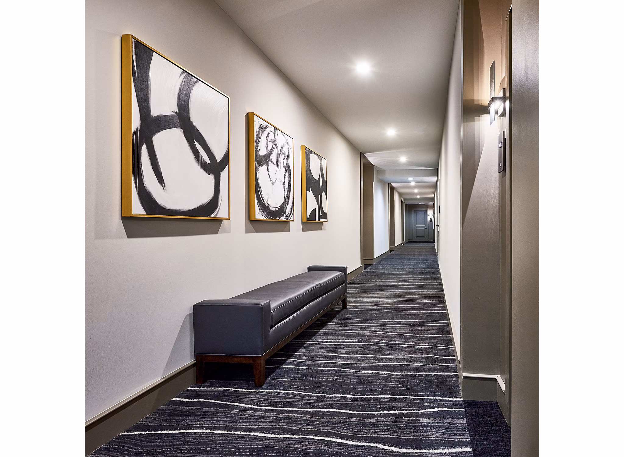 Hallway featuring modern lighting and elegant decor at Solis SouthPark Apartments, luxury living in a central location