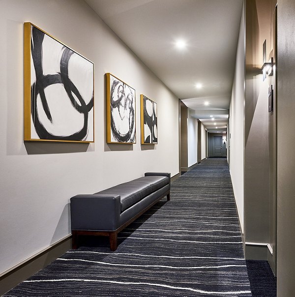 Hallway featuring modern lighting and elegant decor at Solis SouthPark Apartments, luxury living in a central location